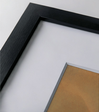 Black frame corner with an ice white mount, shown at an angle