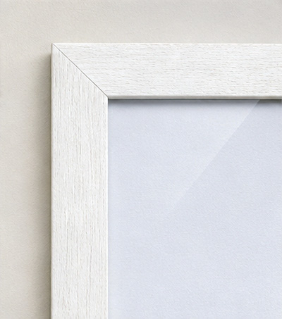 Corner detail of a white wood frame